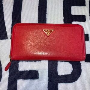 Prada Triangle Logo Plate Round Zip Long Wallet Red Saffiano Leather